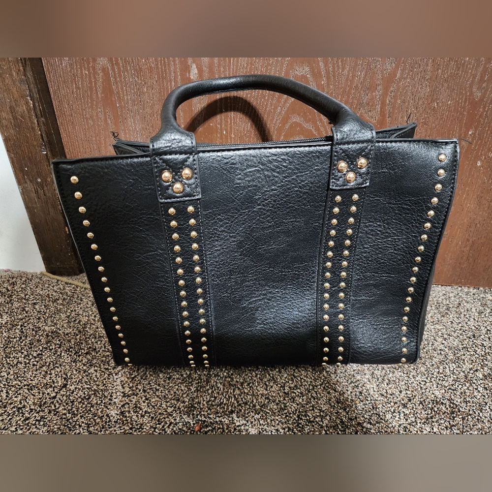 Jesse James black concealed carry purse